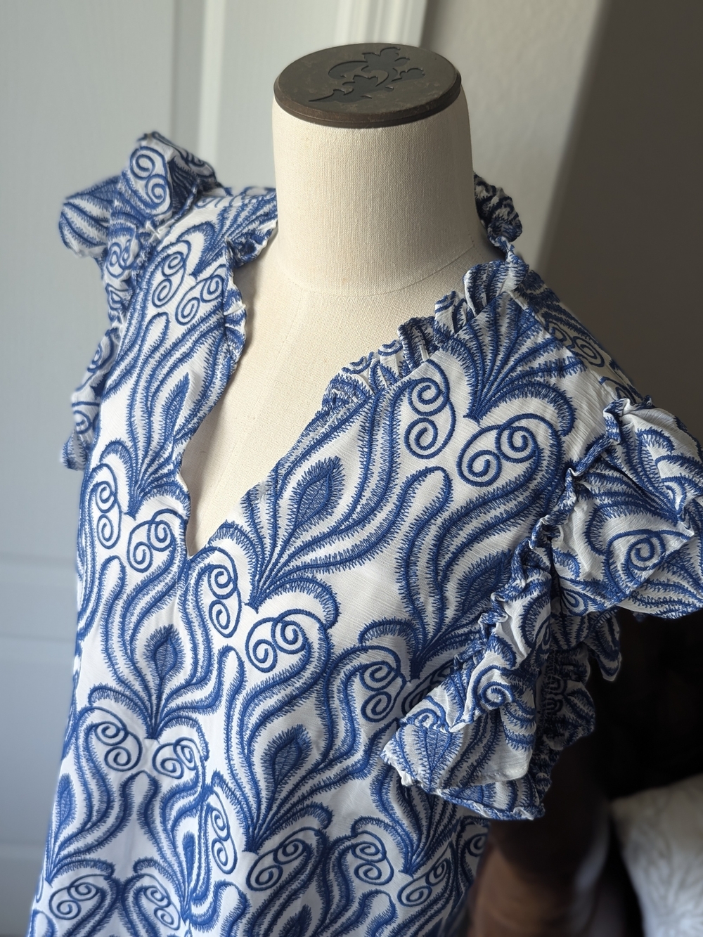 Versona White Top with Blue Embroidered Swirl Ruffles